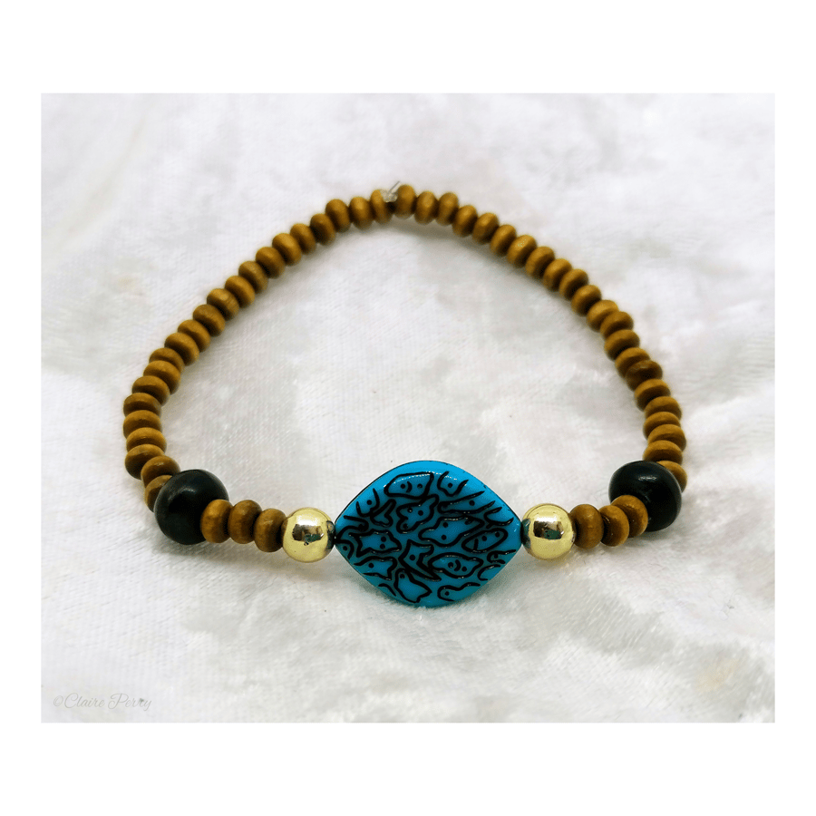 Wooden Surfer's bead bracelet with Turquoise bead.