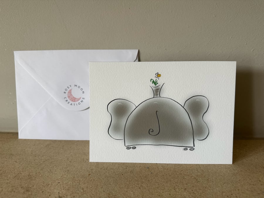 December Birthday Card, Narcissus and Elephant. 