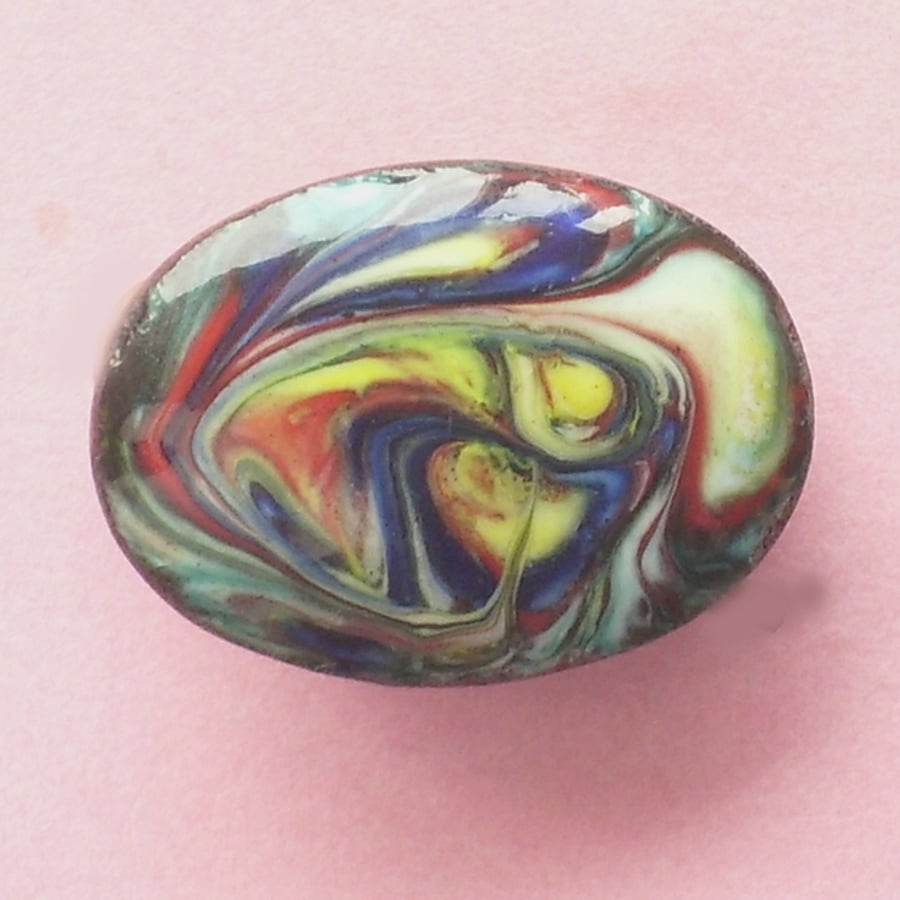 small oval scrolled brooch