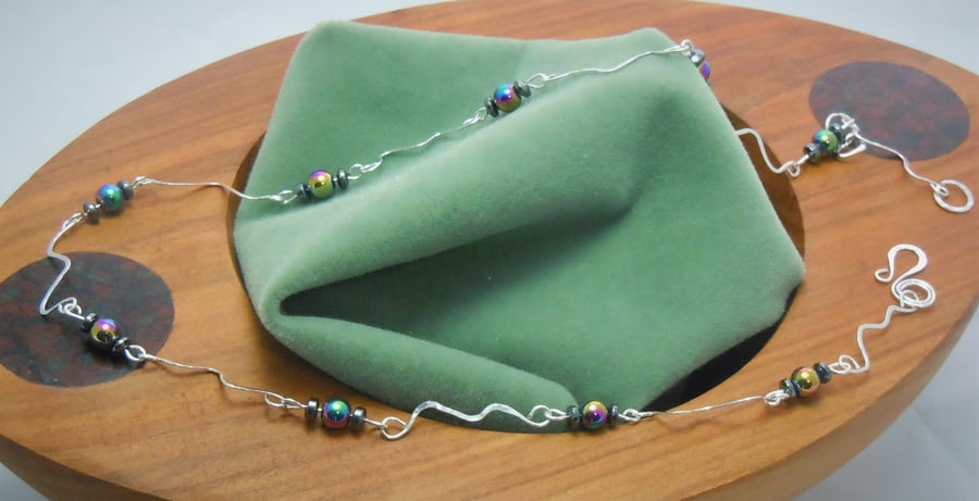 Handcrafted wavy necklace with Hematite rainbow beads