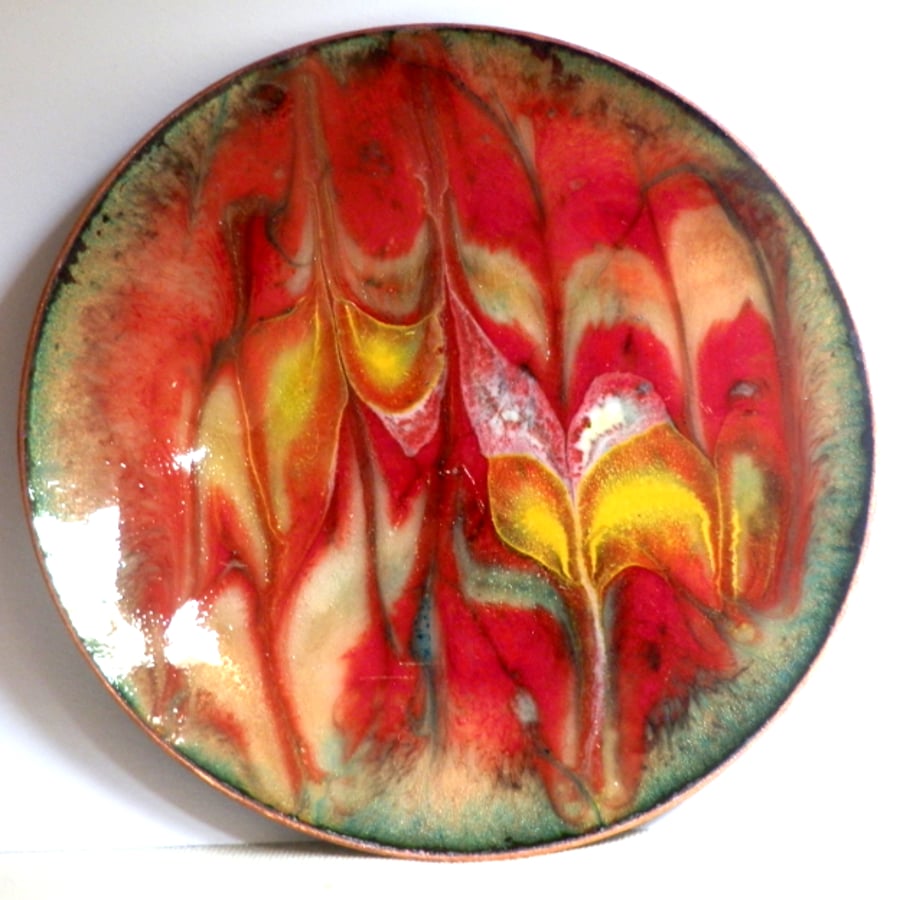 enamel dish - scrolled red and yellow on burnt orange over clear