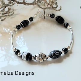 Howlite & Heamotite Tibetan Silver Bracelet (HELP A CHARITY)