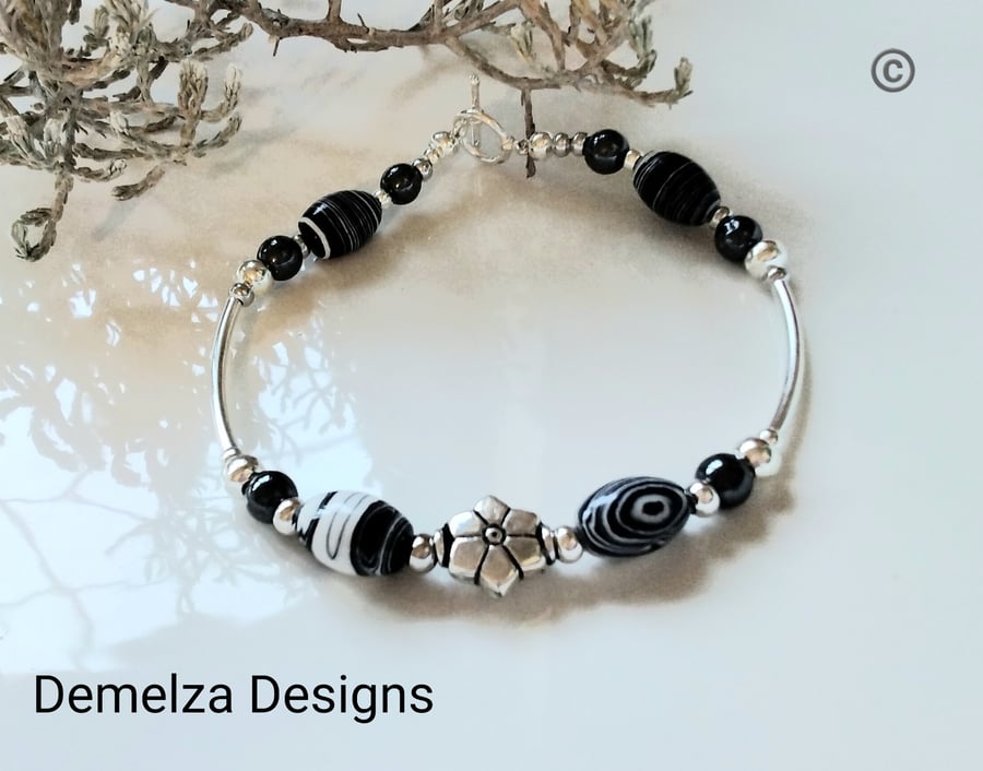 Howlite & Heamotite Tibetan Silver Bracelet (HELP A CHARITY)