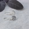 Recycled Silver Circle Earrings With Leaf Pattern