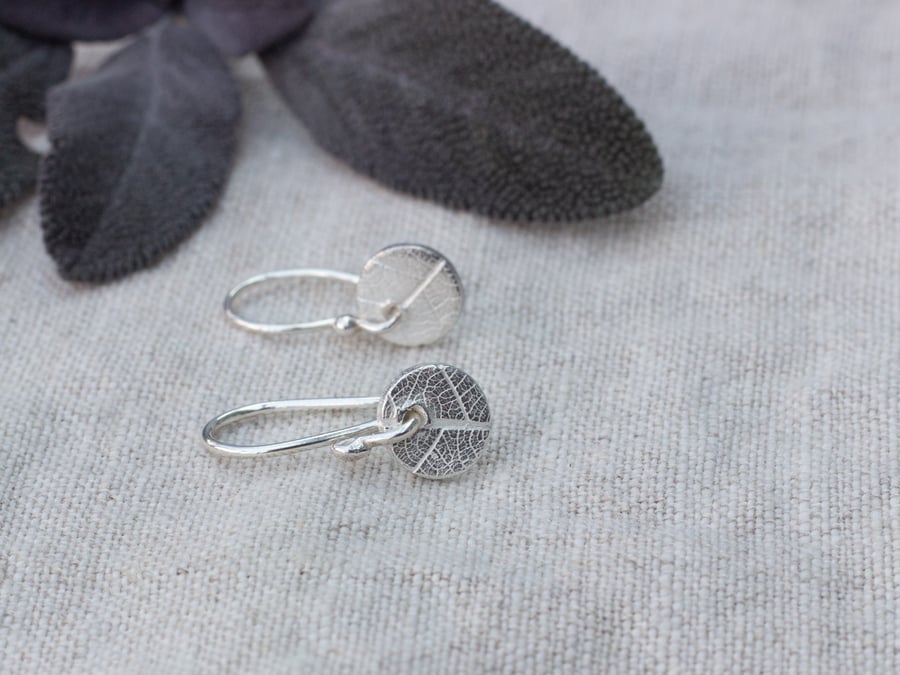 Recycled Silver Circle Earrings With Leaf Pattern