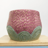 Pink and green ceramic pot