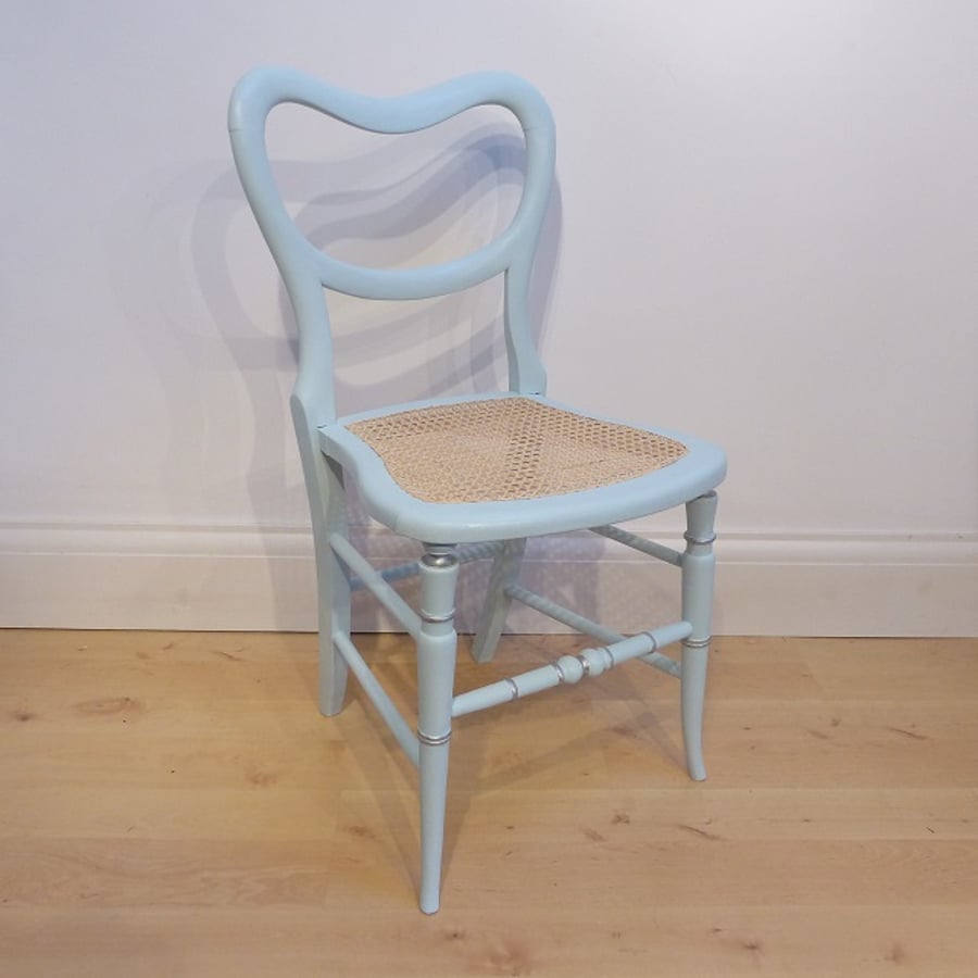 Antique chair in duck egg blue chalk paint, re-caned seat
