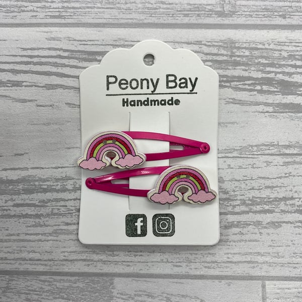 Girl’s rainbow hair clips in pink