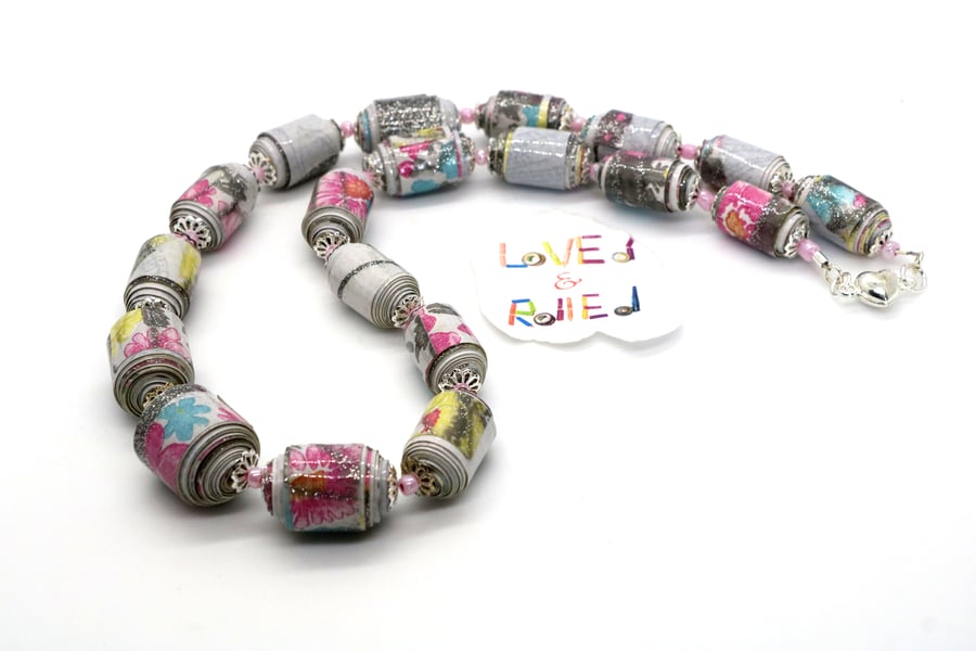 Sparkly necklace with graded glittery paper beads made of wall paper