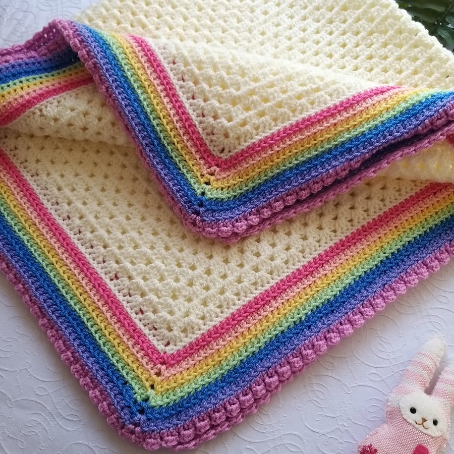 Crochet Baby Blanket. Cream Granny Square Rainbow Border