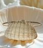 Gold Bangle With Silver Rings - Image 1