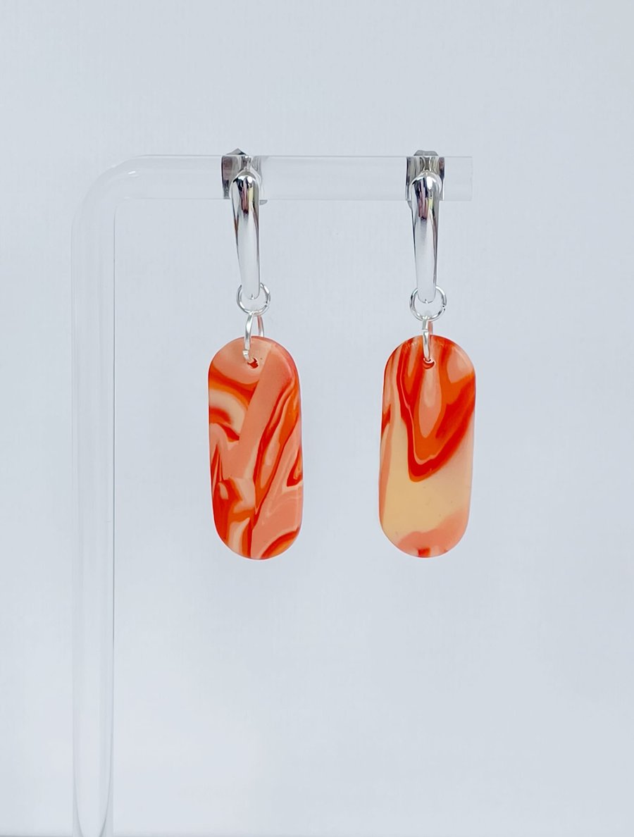 Unique oblong orange marble effect dangle polymer clay earrings