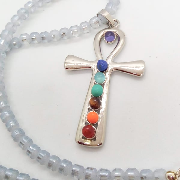 Silver Cross Chakra Pendant on a Blue Grey Beaded Choker Necklace