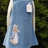 Pale blue baby needlecord pinafore dress. Age: 4-5 years. Free postage to UK