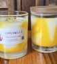 Citronella soy candle in a clear glass jar