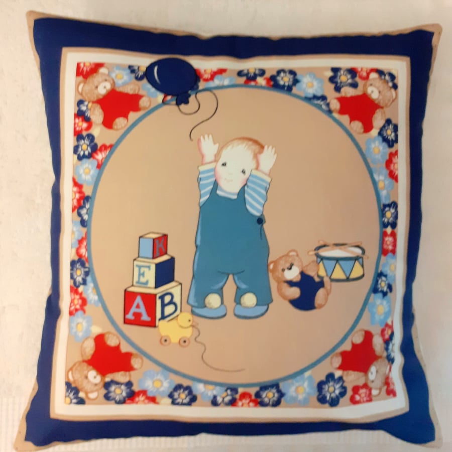 Little Boy playing with A Balloon Cushion