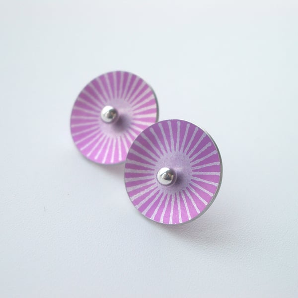 Pink and silver sunburst circle studs