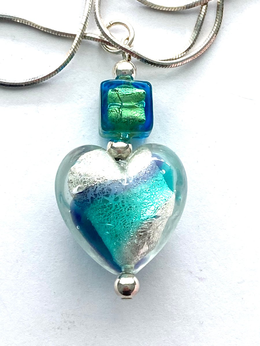 Murano glass purple and green Murano Glass heart pendant with sterling silver.