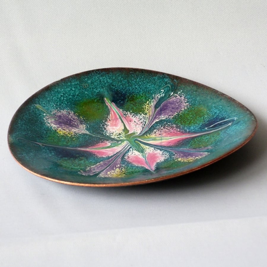 dish - scrolled white, pink. purple,gold, blue, on turquoise over clear enamel