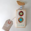 Sale-was 12.00 now 6.00 Wooden Bird Hanging with Button Flowers