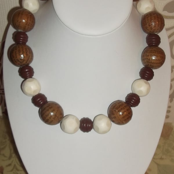 Brown newspaper print and wood beaded necklace