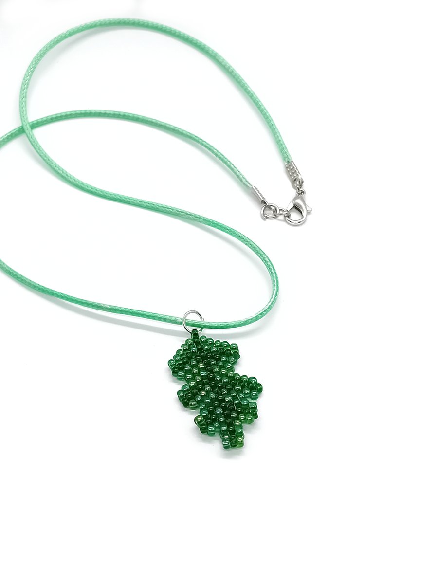 Green oak leaf beaded pendant cord necklace