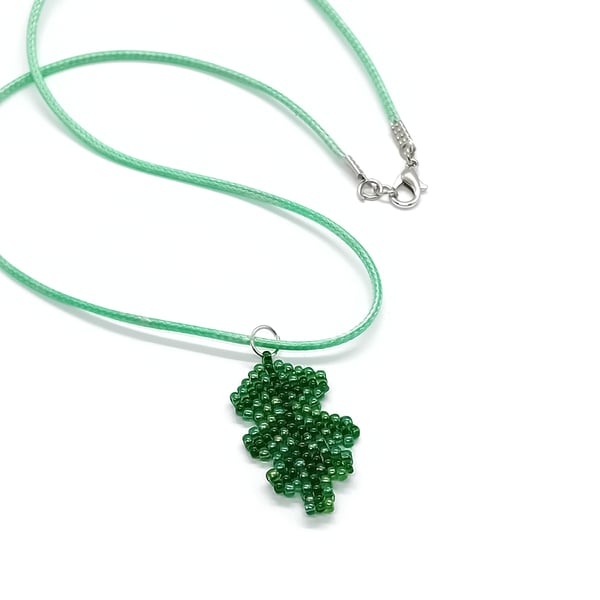 Green oak leaf beaded pendant cord necklace