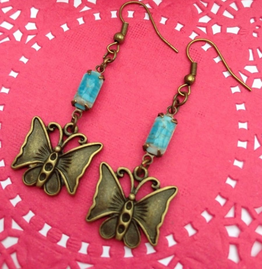 FREE P&P Pretty brass butterfly earrings with blue vintage glass stones