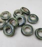 10 Medium Forest Green Glazed Ceramic Donut Beads - Image 1