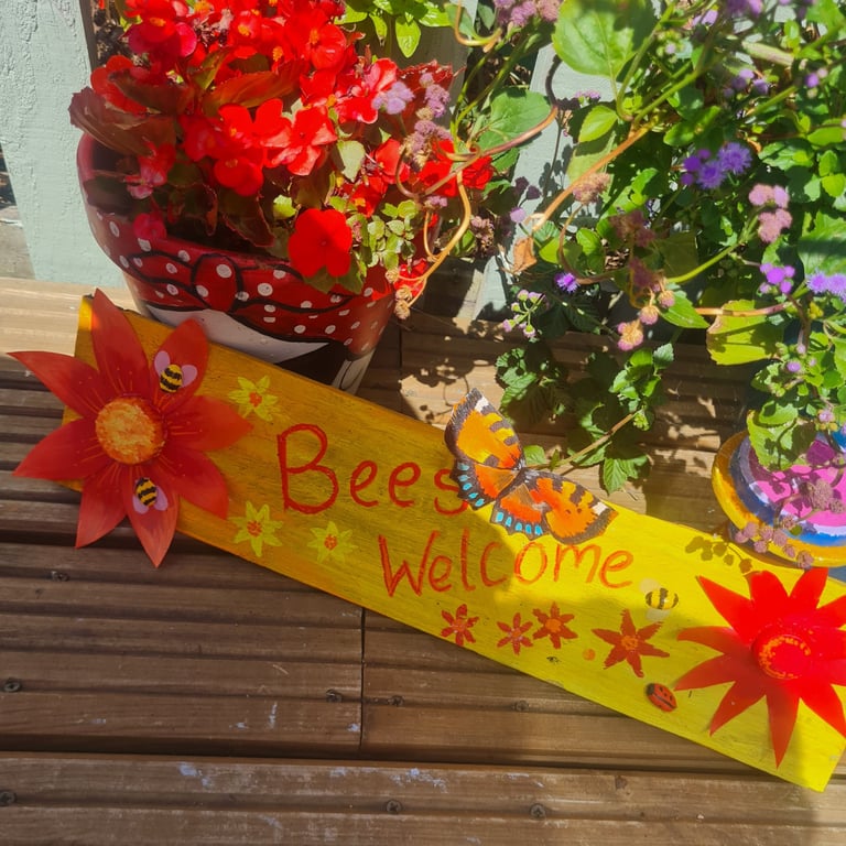 Handmade, upcycled wooden "bees welcome" sign