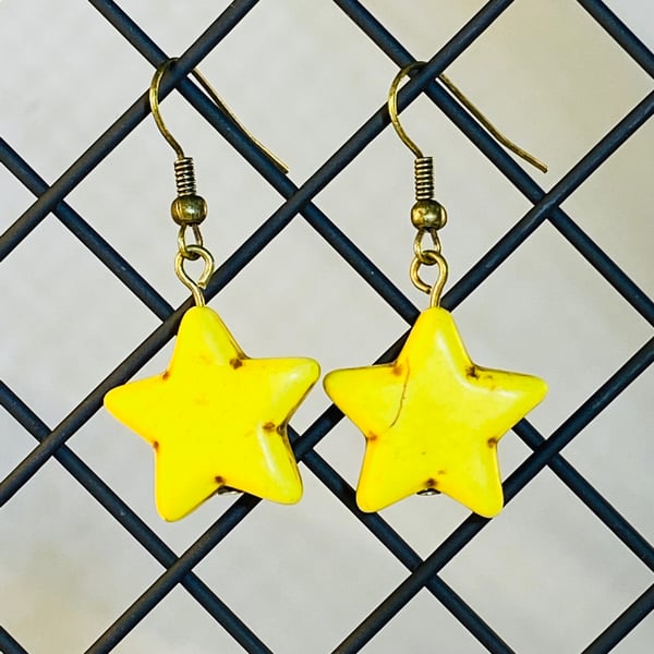 Yellow star earrings 