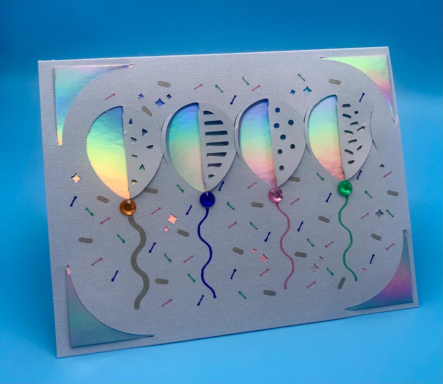 Celebration card, holographic balloon design, fold and tuck, blank inside,