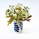 A pretty little porcelain posy vase made by Linda in her pottery in Winchester