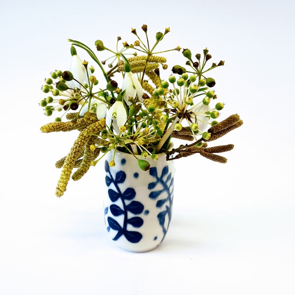 A pretty little porcelain posy vase made by Linda in her pottery in Winchester