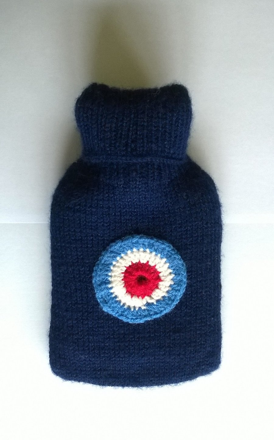 Hand knitted navy blue RAF hot water bottle cover 