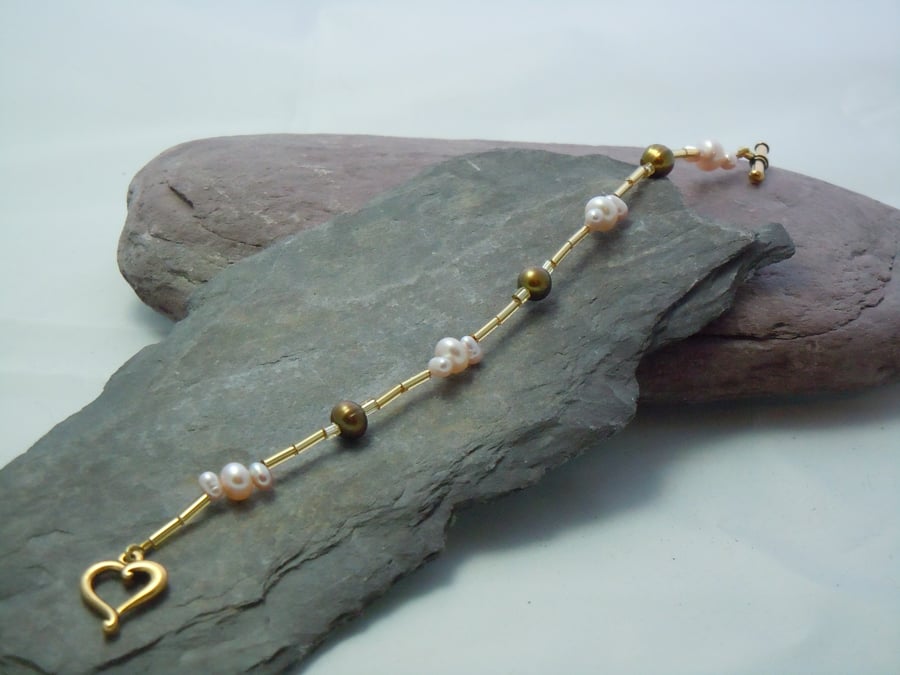  Freshwater Pearl bracelet with glass beads & a heart clasp