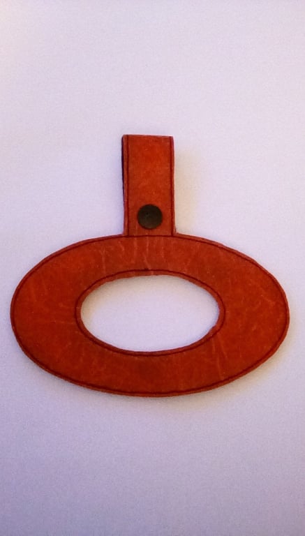 186. Oval tea towel holder.