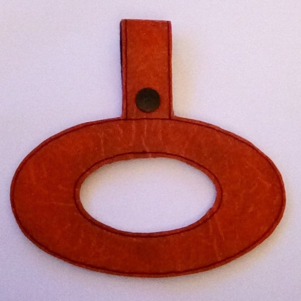 186. Oval tea towel holder.