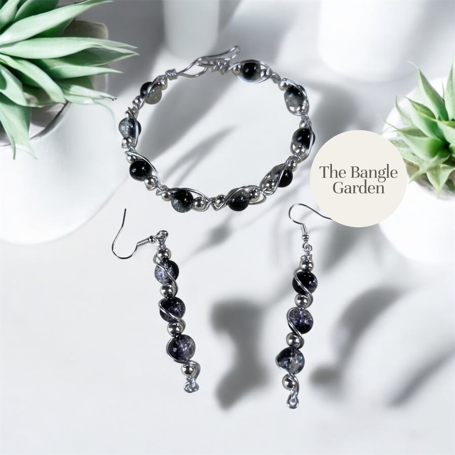 Handmade wire wrapped black & silver bangle & earring set.