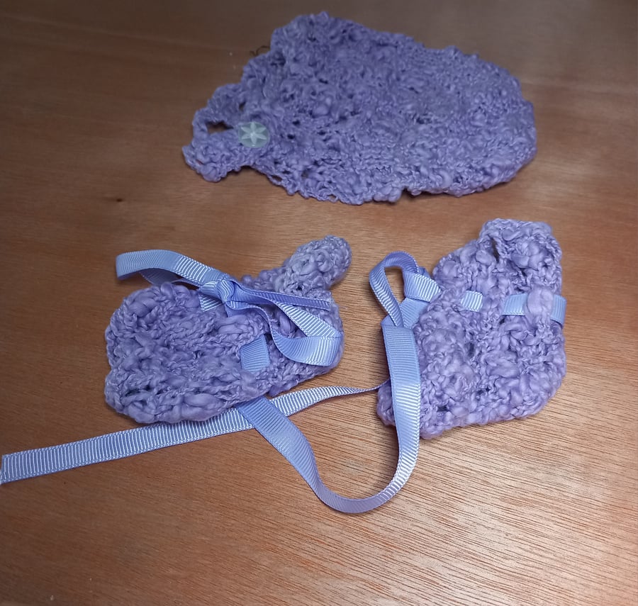 Lilac hand knitted childs hat helmet hood and booties set