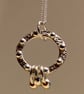 Circular silver necklace with tiny silver studs and 3 rings  - Image 3