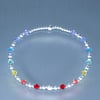 Sterling Silver bracelet with swarovski bicones in rainbow chakra colours