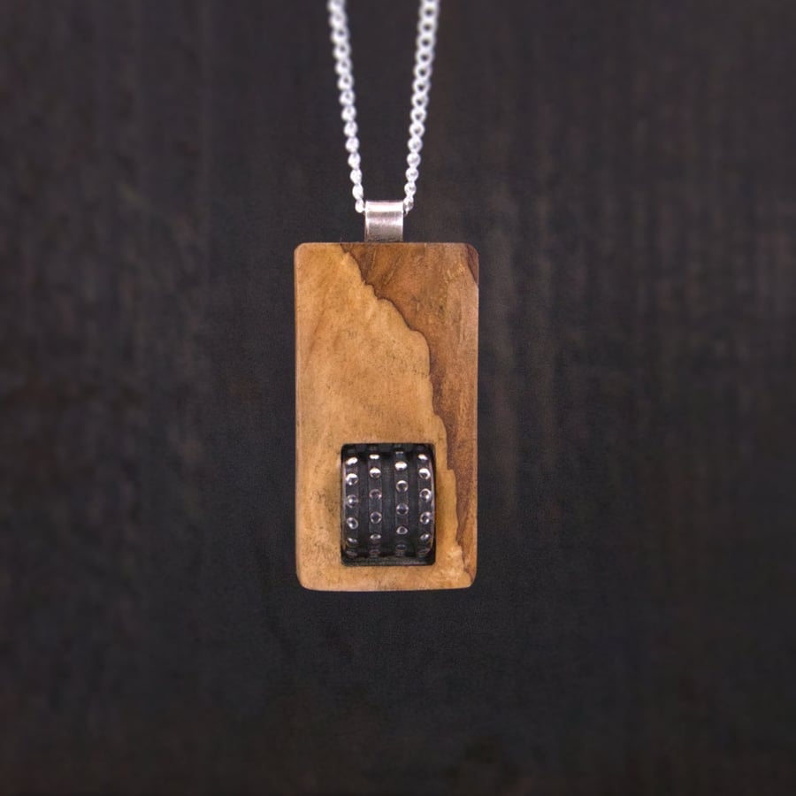 The First and Foremost No. 1 - Olive, steel and silver fidget pendant