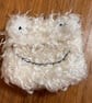 Cream monster face purse