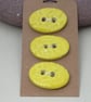 3 Medium Oval Lemon Yellow Sprig Pattern Ceramic Buttons - Image 1