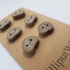 Set of six flat driftwood disk buttons