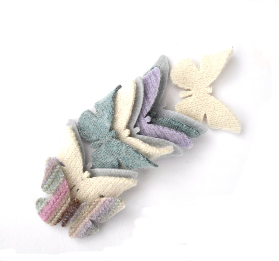 Pastel felt butterfly shapes made from old recycled wool sweaters