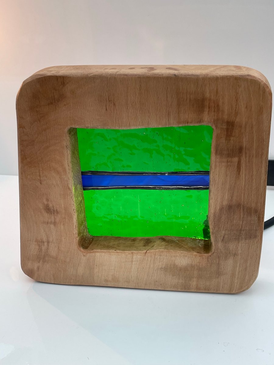 Stained glass green and blue in a beech wood frame