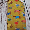 Dogs on mustard padded glasses case