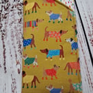 Dogs on mustard padded glasses case